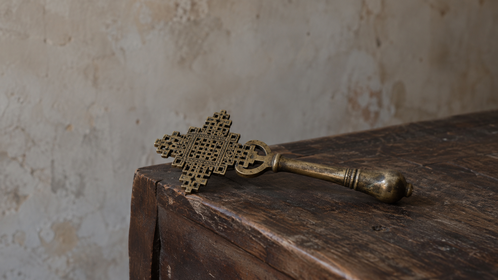 A cross left at the edge of a table at church